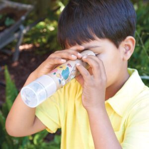 child using a kaleidoscope